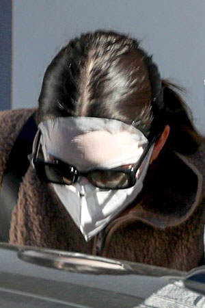 Kendall Jenner leaving plastic surgeon’s clinic in a Full face mask